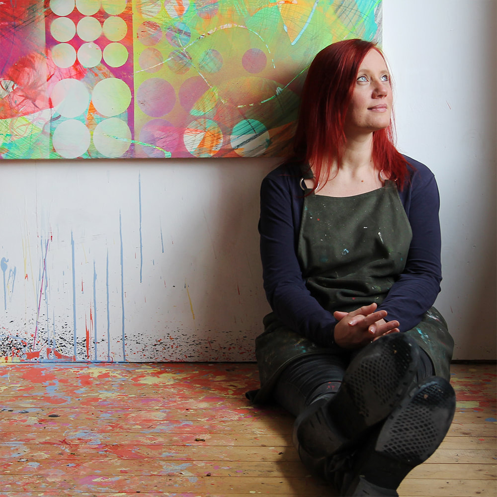 Modern colourful abstract artist Kate Green in her home art studio